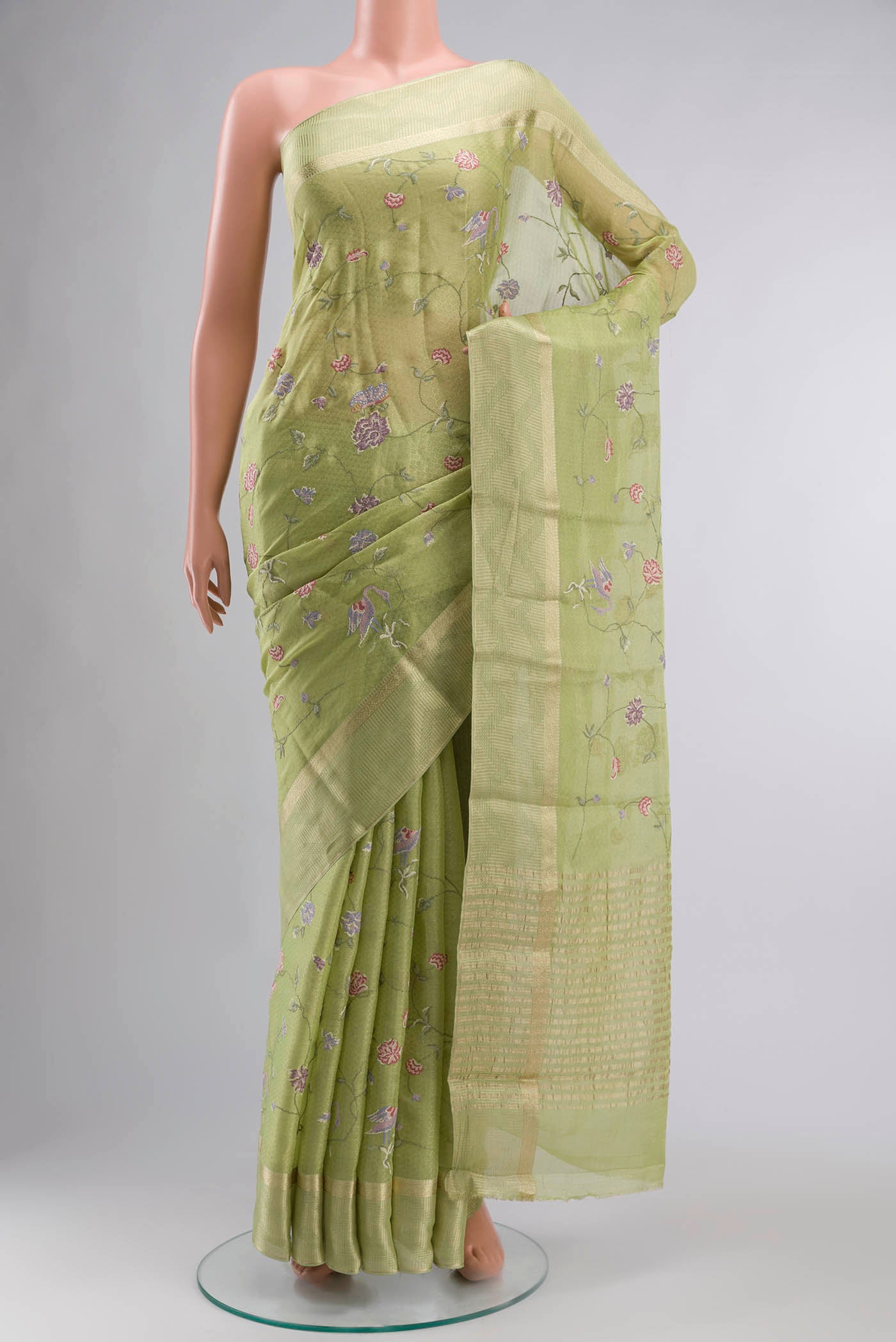Green Mysore Georgette Saree with Embroidery on the body and Zari Border displayed on a mannequin
