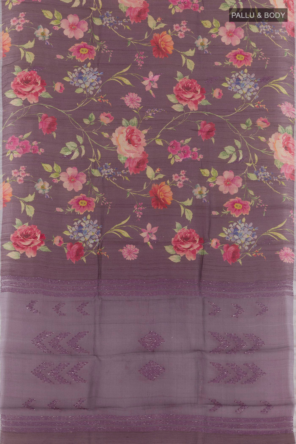 Flat view of Purple Tussar Saree with Printed design on the body and Zari Border. 