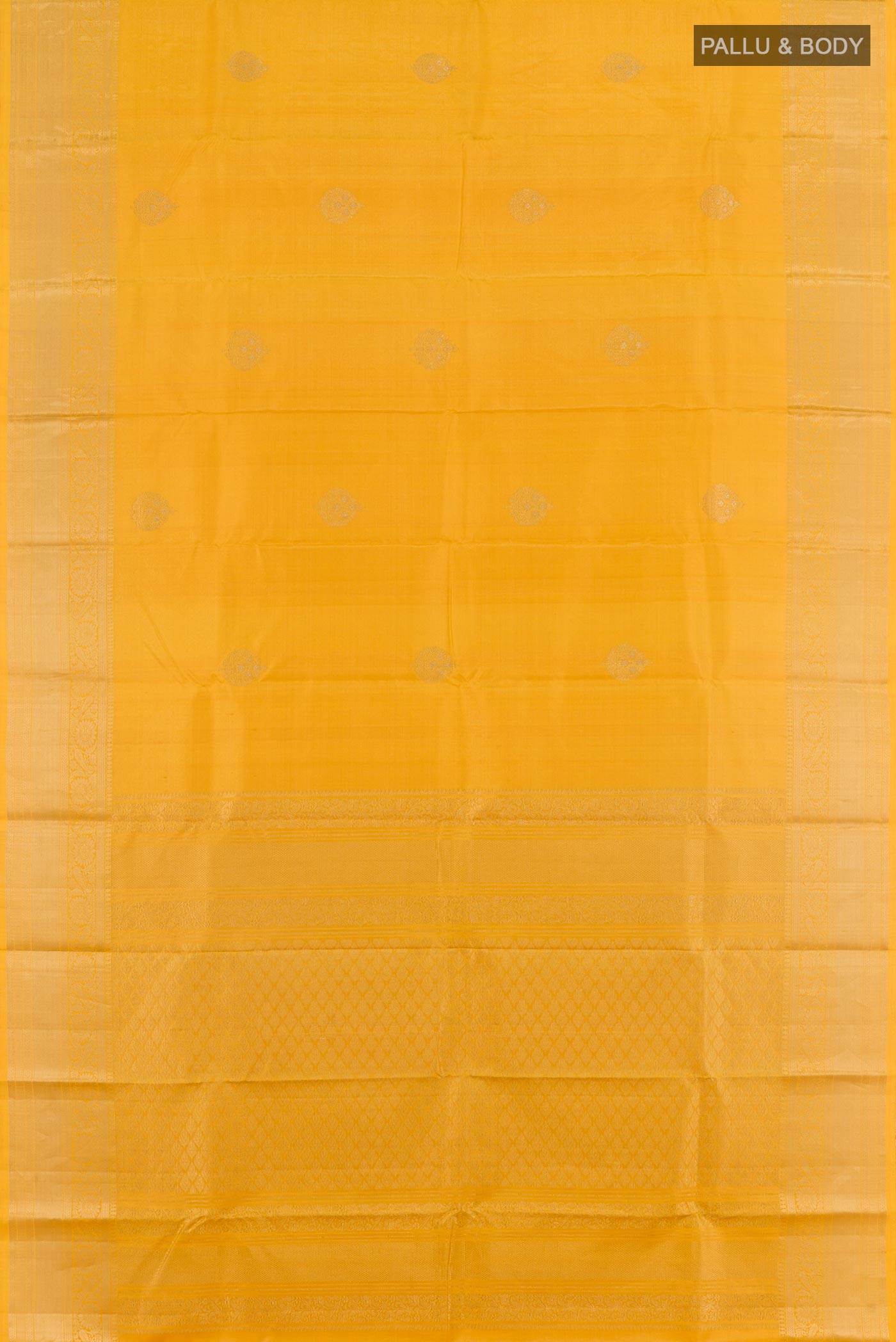 Flat view of Yellow Kanchipuram Silk Saree with Zari Butta on the body and Zari Border. 