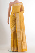 Pure Silk Yellow Soft Saree with Zari Brocade on the body and Zari Border.  displayed on a mannequin