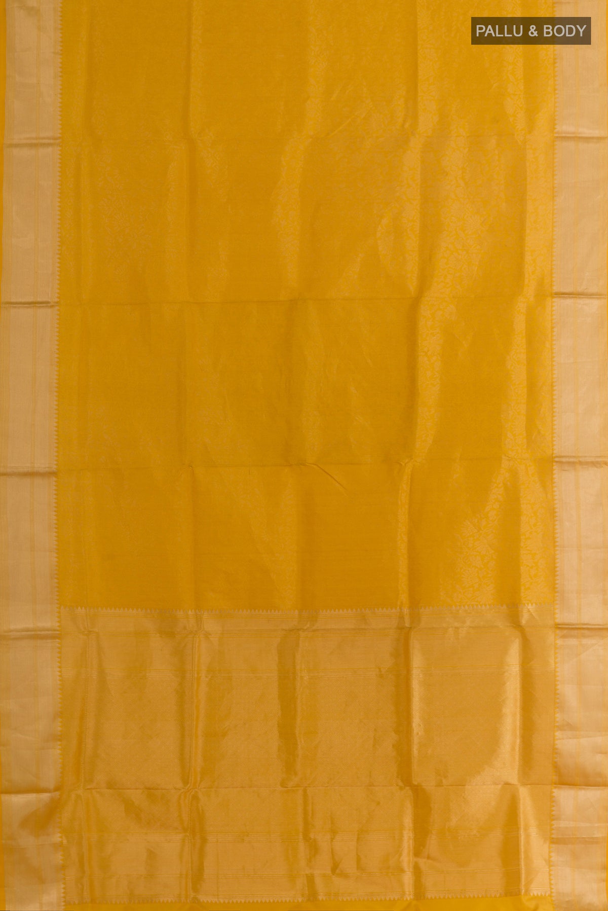 Flat view of Pure Silk Yellow Soft Saree with Zari Brocade on the body and Zari Border. 