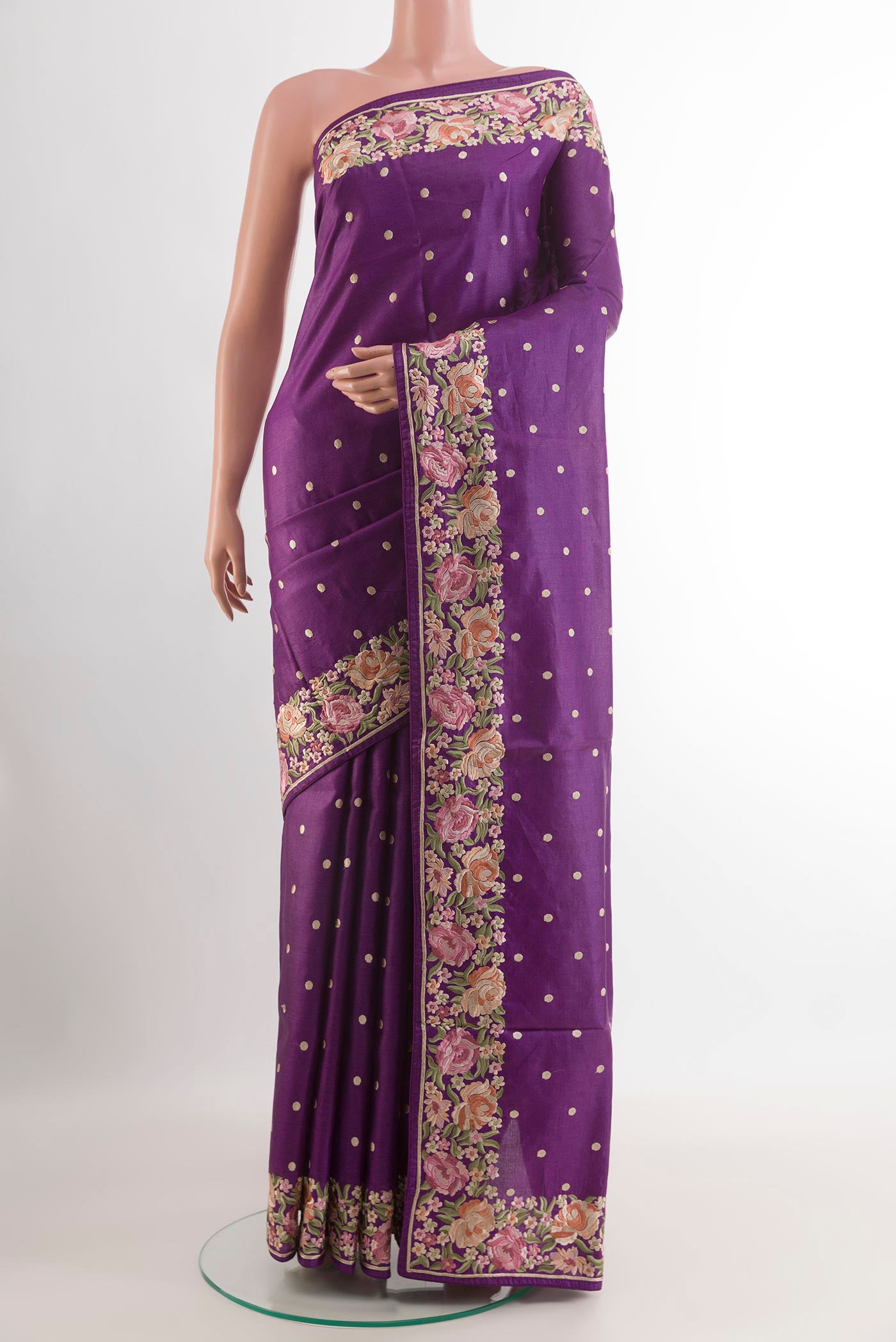 Purple Tussar Saree with Embroidery on the body and Embroidery Border.  displayed on a mannequin