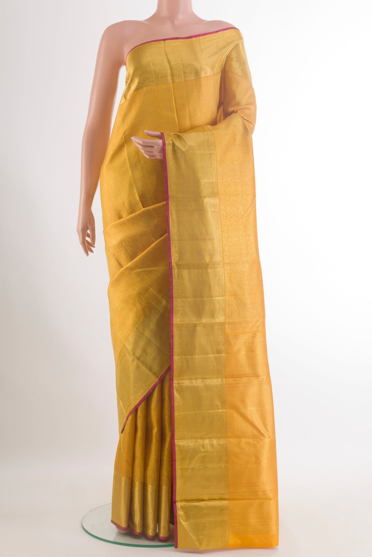 Pure Silk Yellow Kanchipuram Saree with Zari Brocade on the body and Zari Border.  displayed on a mannequin