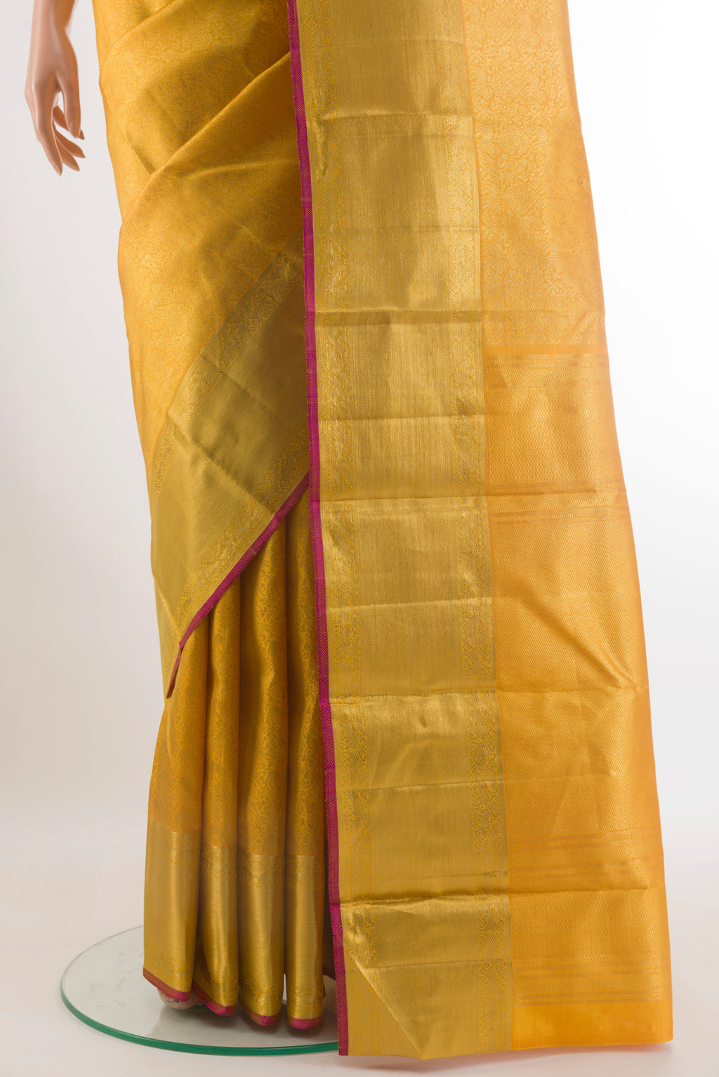 Pleats and pallu of Pure Silk Yellow Kanchipuram Saree with Zari Brocade on the body and Zari Border. 