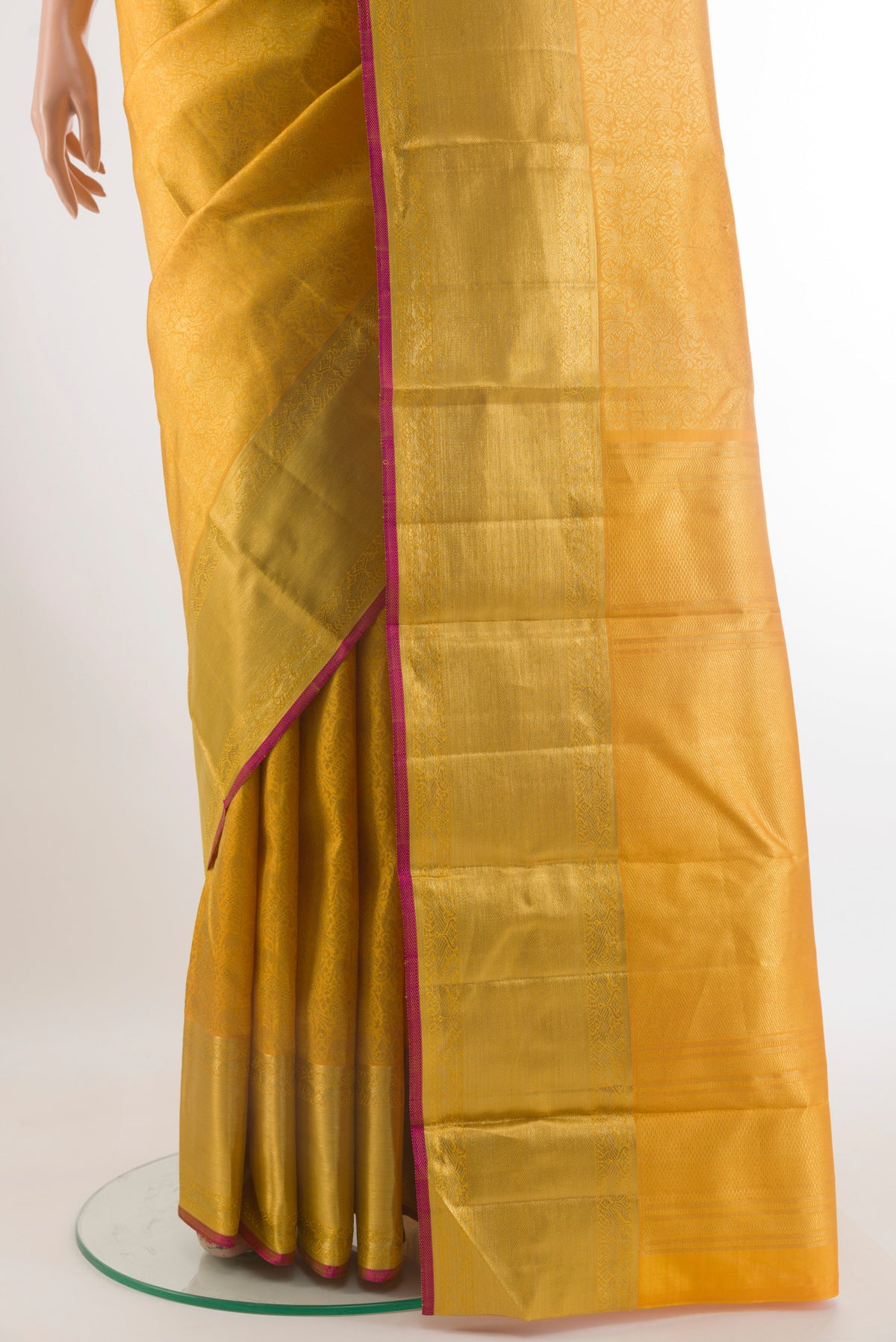 Pleats and pallu of Pure Silk Yellow Kanchipuram Saree with Zari Brocade on the body and Zari Border. 