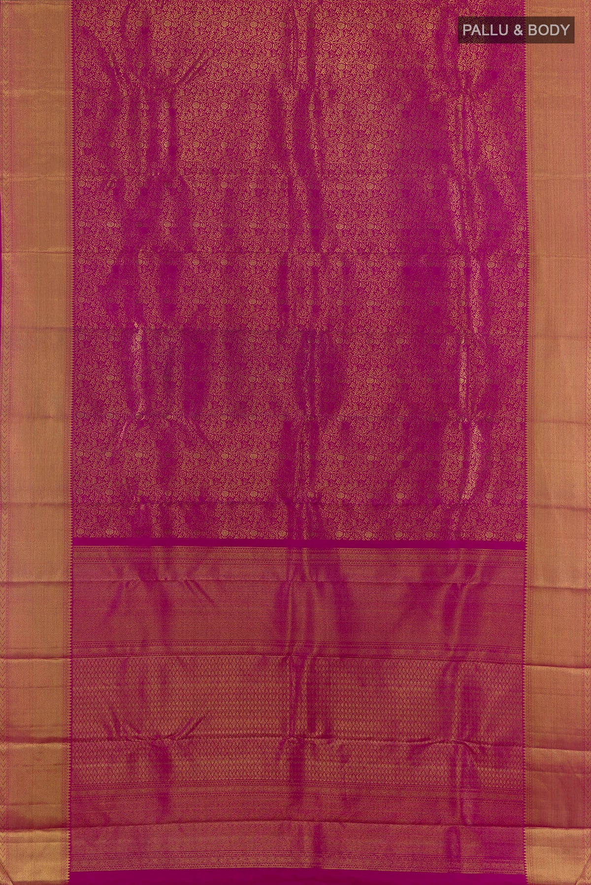 Flat view of Pure Silk Pure Zari Magenta Kanjivaram Saree with Zari Brocade on the body and Zari Border. 