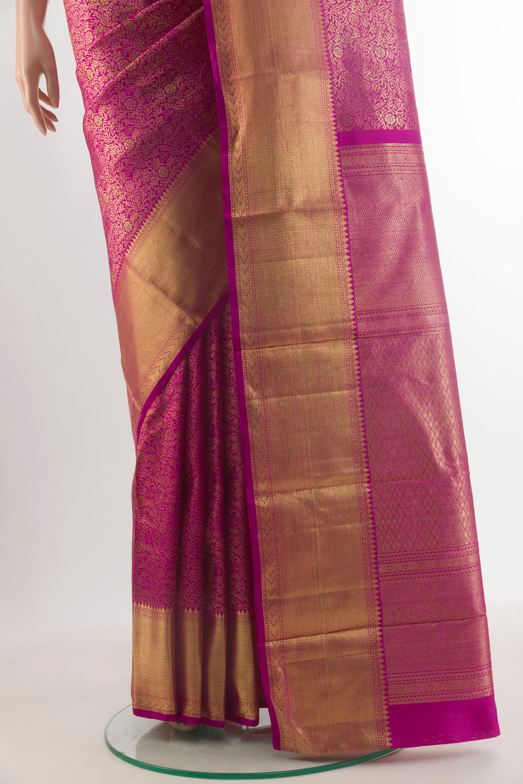Pleats and pallu of Pure Silk Pure Zari Magenta Kanjivaram Saree with Zari Brocade on the body and Zari Border. 