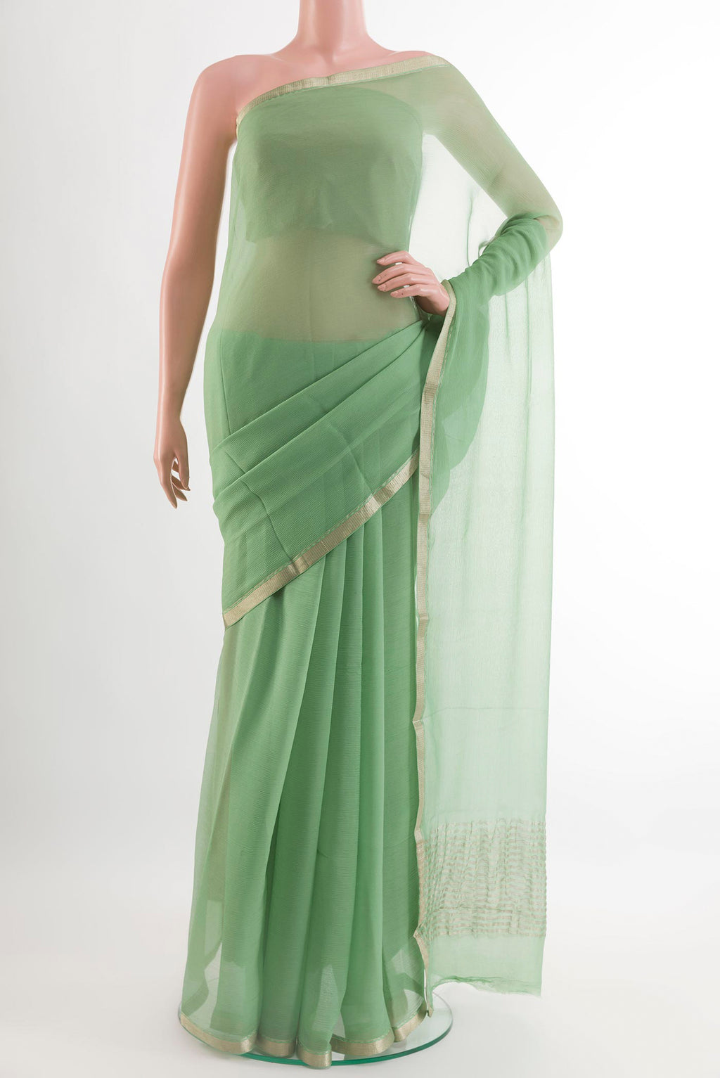 Green Mysore Chiffon Saree with Plain Body and Plain Border.  displayed on a mannequin
