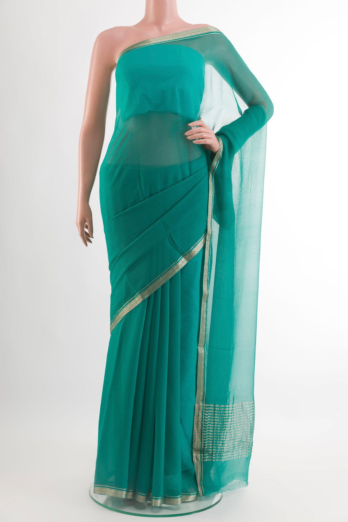 Sea Green Mysore Chiffon Saree with Plain Body and Plain Border.  displayed on a mannequin