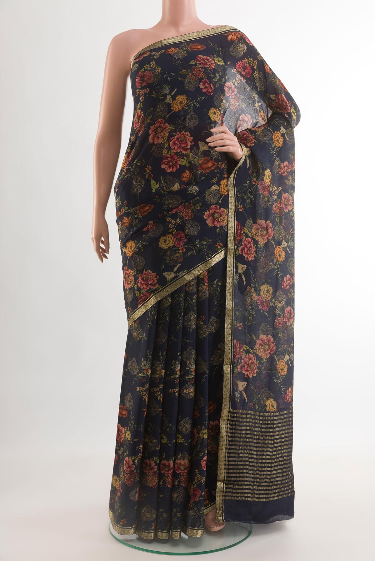 Navy Blue Mysore Chiffon Saree with Floral Print on the body and Zari Border.  displayed on a mannequin