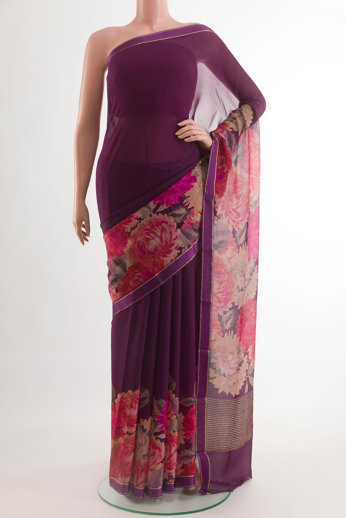 Purple Chiffon Saree with Printed design on the body and Plain Border.  displayed on a mannequin