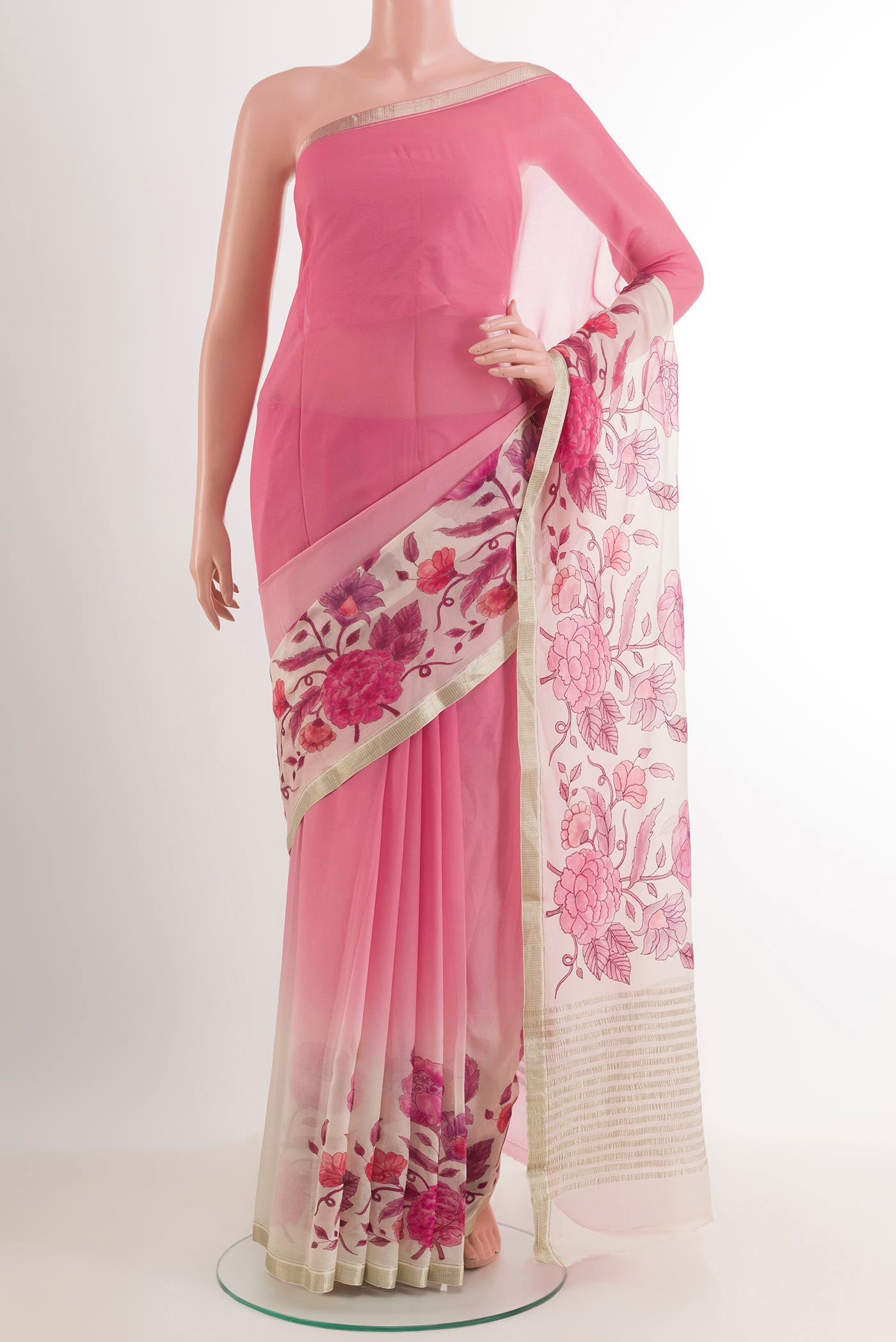 Pink Mysore Chiffon Saree with Printed design on the body and Zari Border.  displayed on a mannequin