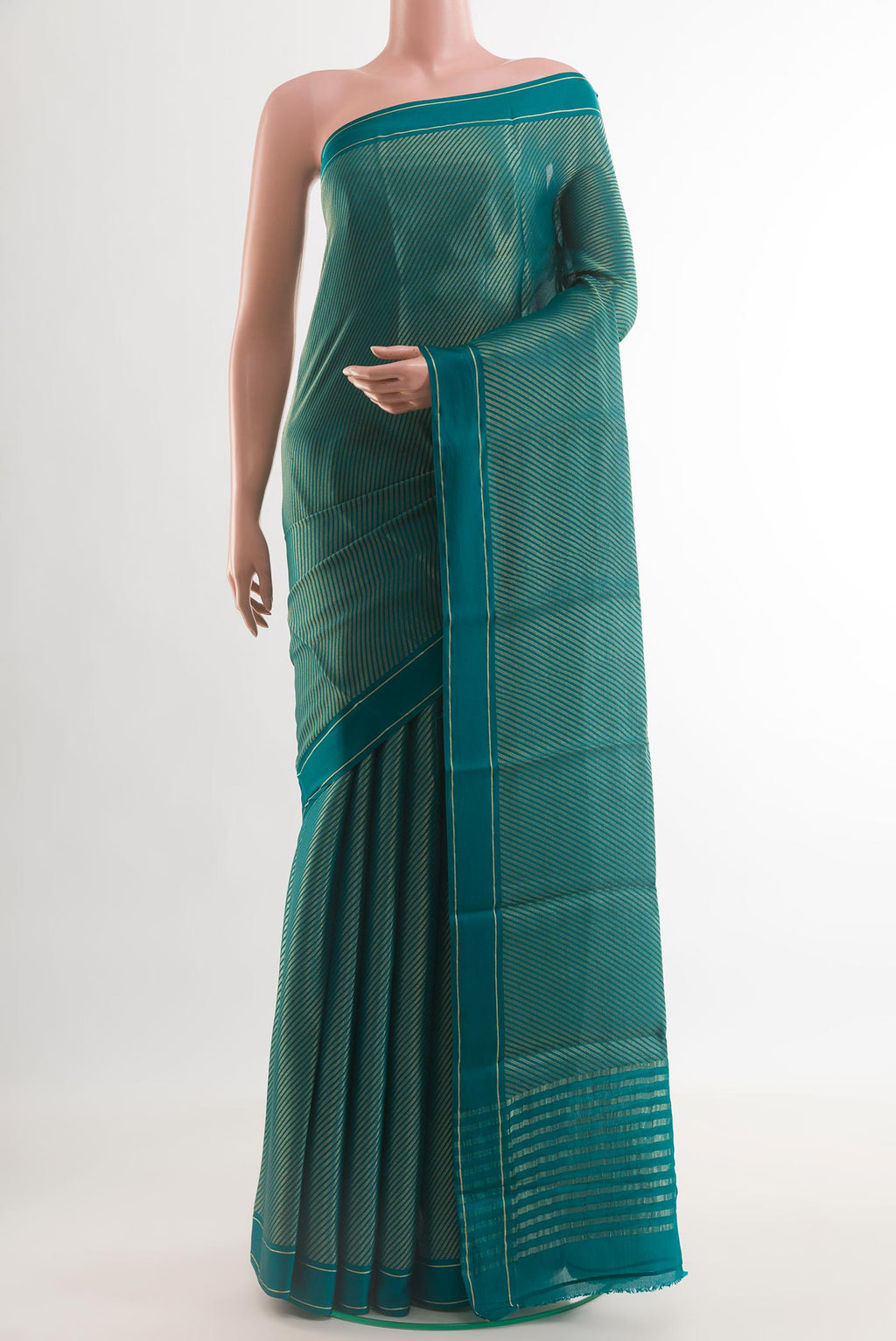 Blue Mysore Crepe Saree with Stripes on the body and Zari Border.  displayed on a mannequin