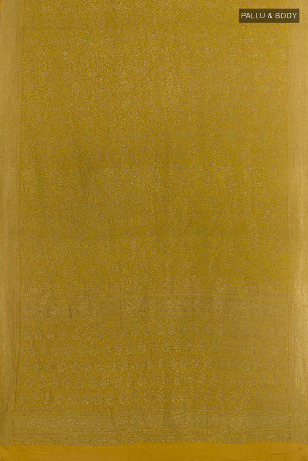 Flat view of Pure Silk Mustard Mysore Crepe Saree with Zari Brocade on the body and Zari Border. 