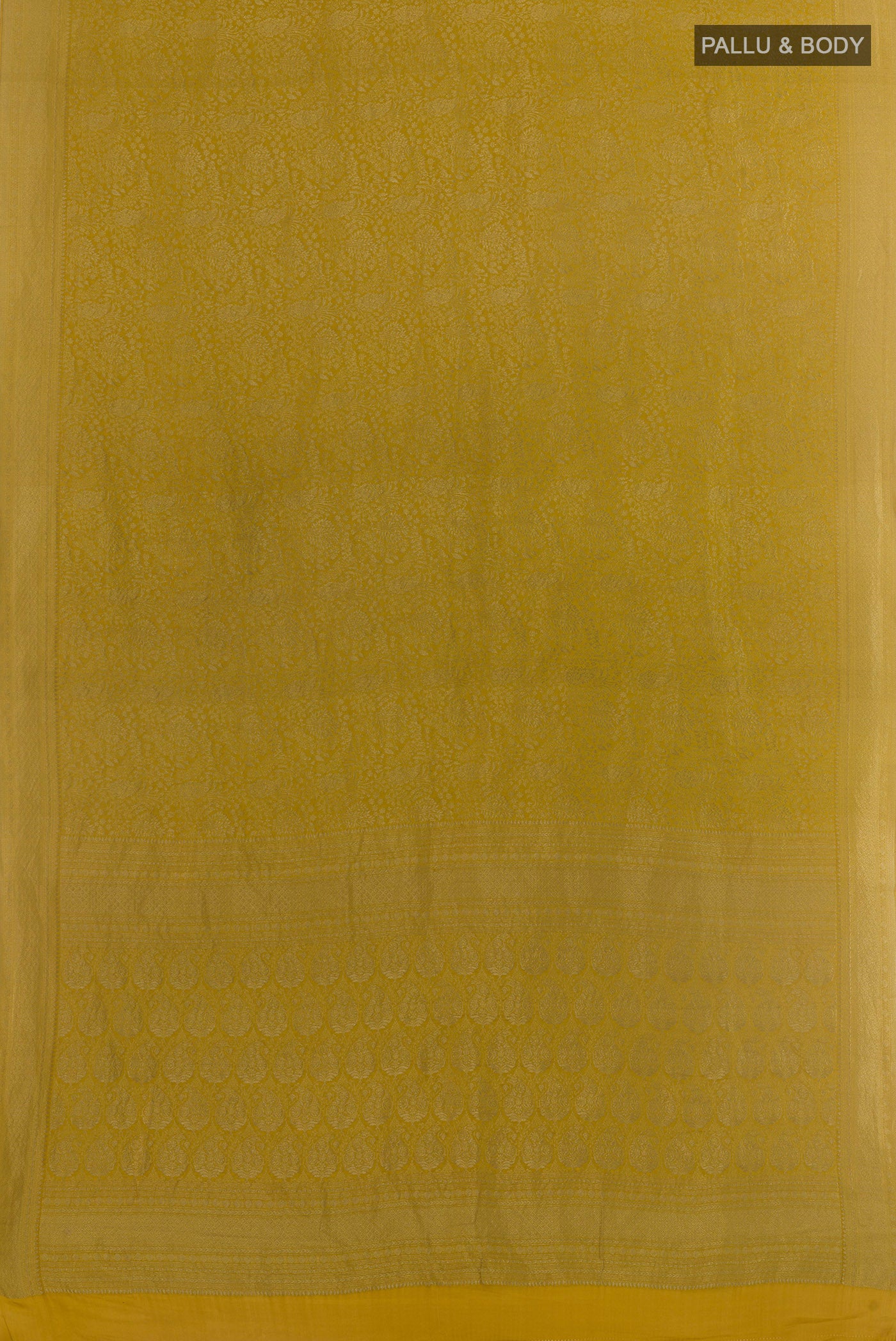 Flat view of Pure Silk Mustard Mysore Crepe Saree with Zari Brocade on the body and Zari Border. 