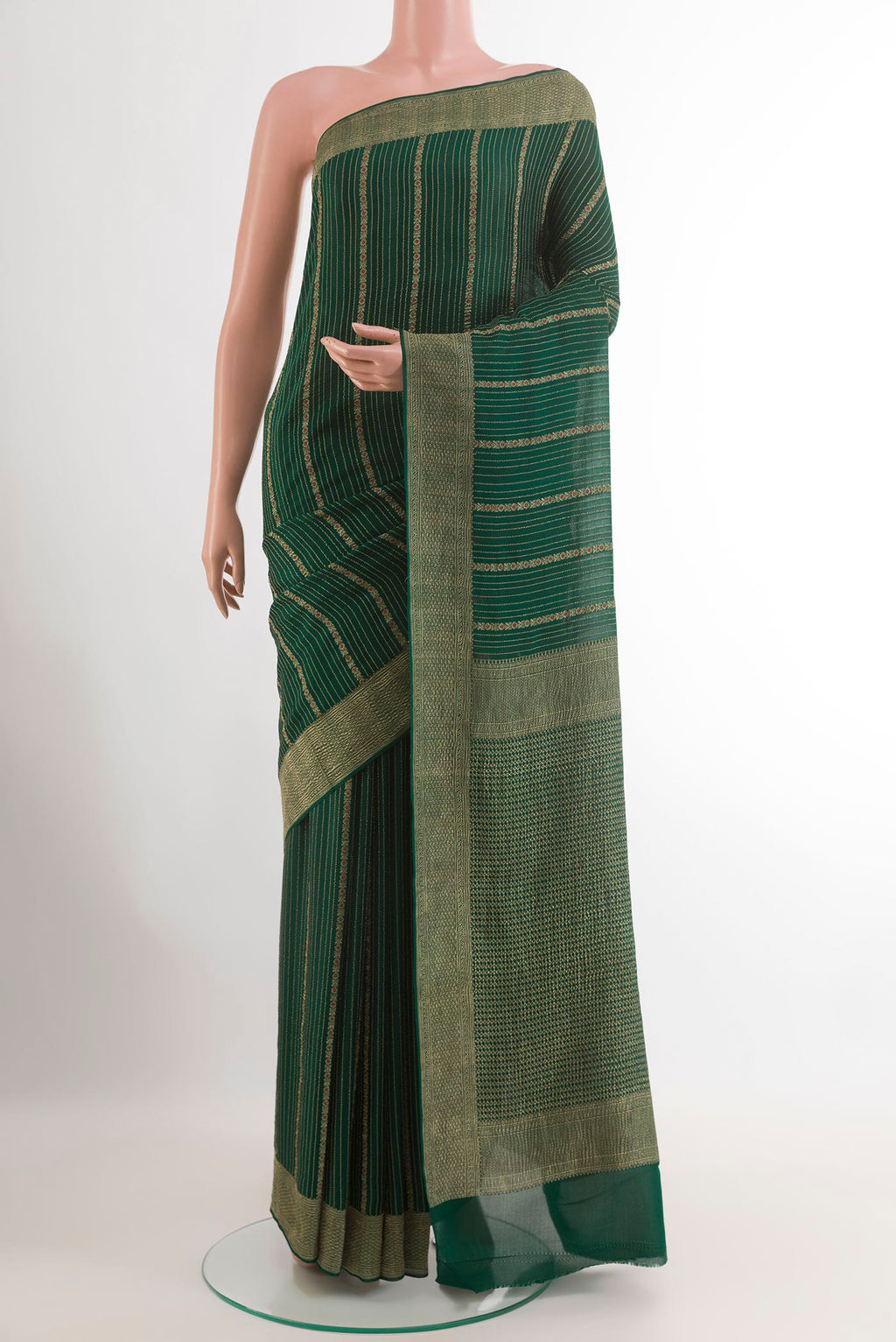Green Mysore Crepe Saree with Stripes on the body and Zari Border.  displayed on a mannequin