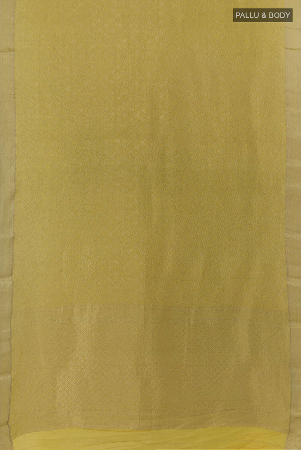 Flat view of Yellow Mysore Crepe Saree with Zari Brocade on the body and Zari Border. 