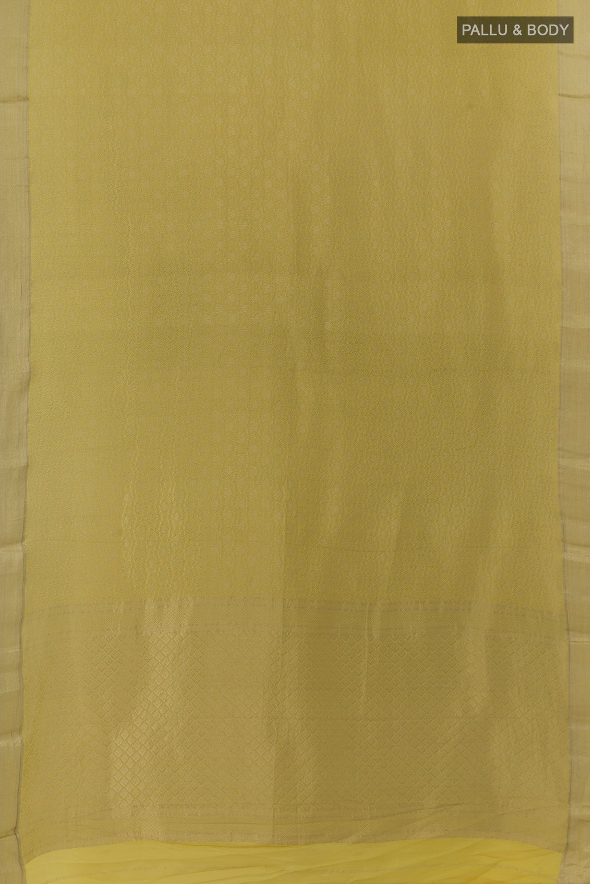 Flat view of Yellow Mysore Crepe Saree with Zari Brocade on the body and Zari Border. 