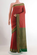 Red Mysore Crepe Saree with Zari Butta on the body and Zari Border.  displayed on a mannequin