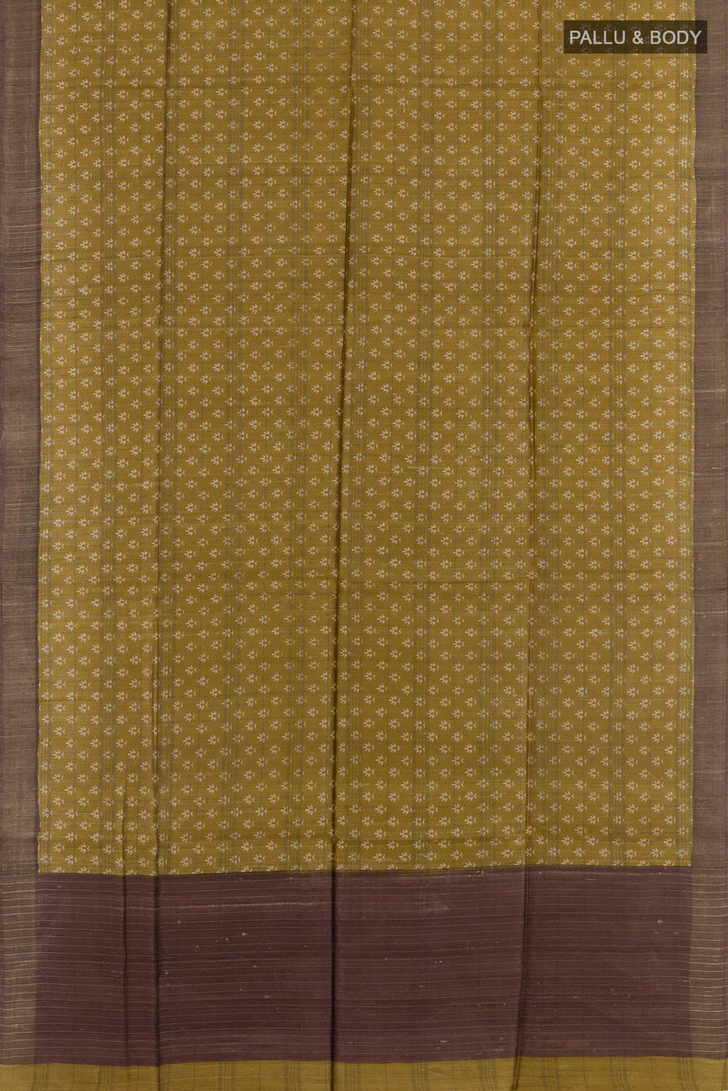 Flat view of Yellow Tussar Saree with Printed design on the body and Zari Border. 