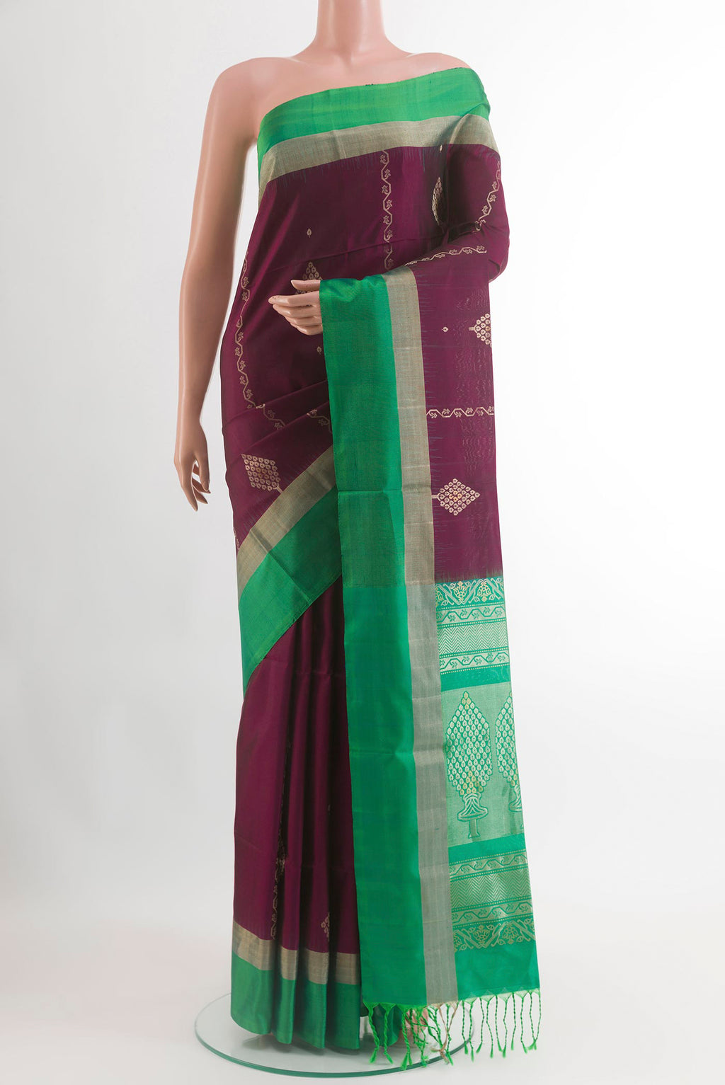 Purple Soft Silk Saree with Zari Butta on the body and Zari Border.  displayed on a mannequin