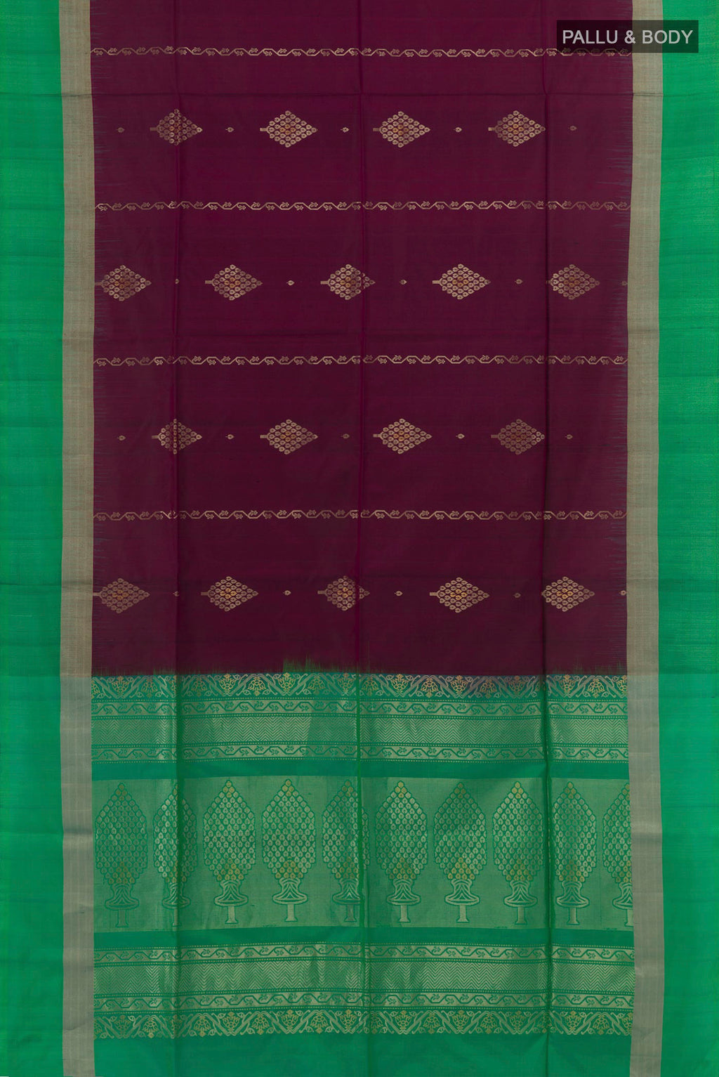 Flat view of Purple Soft Silk Saree with Zari Butta on the body and Zari Border. 