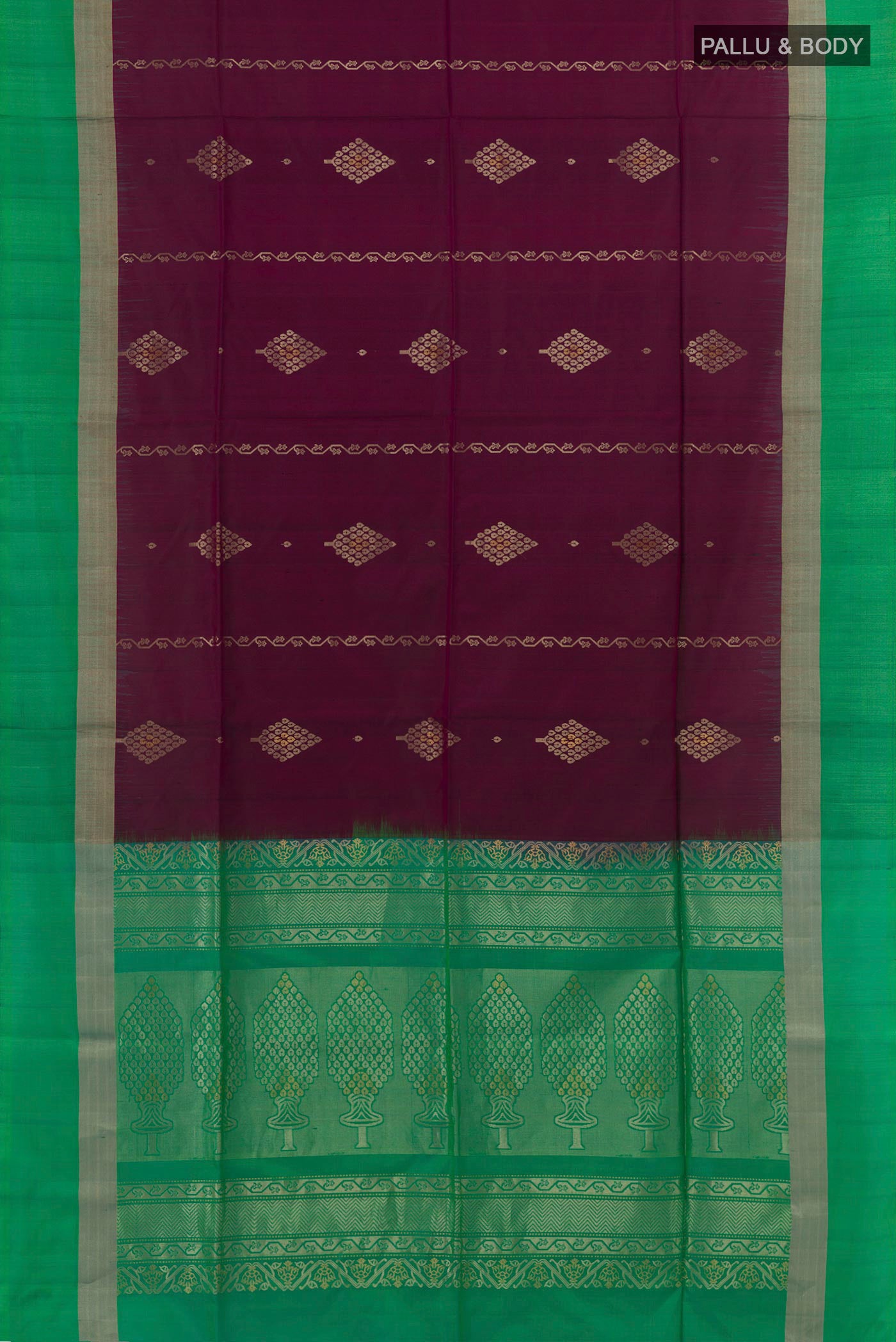 Flat view of Purple Soft Silk Saree with Zari Butta on the body and Zari Border. 
