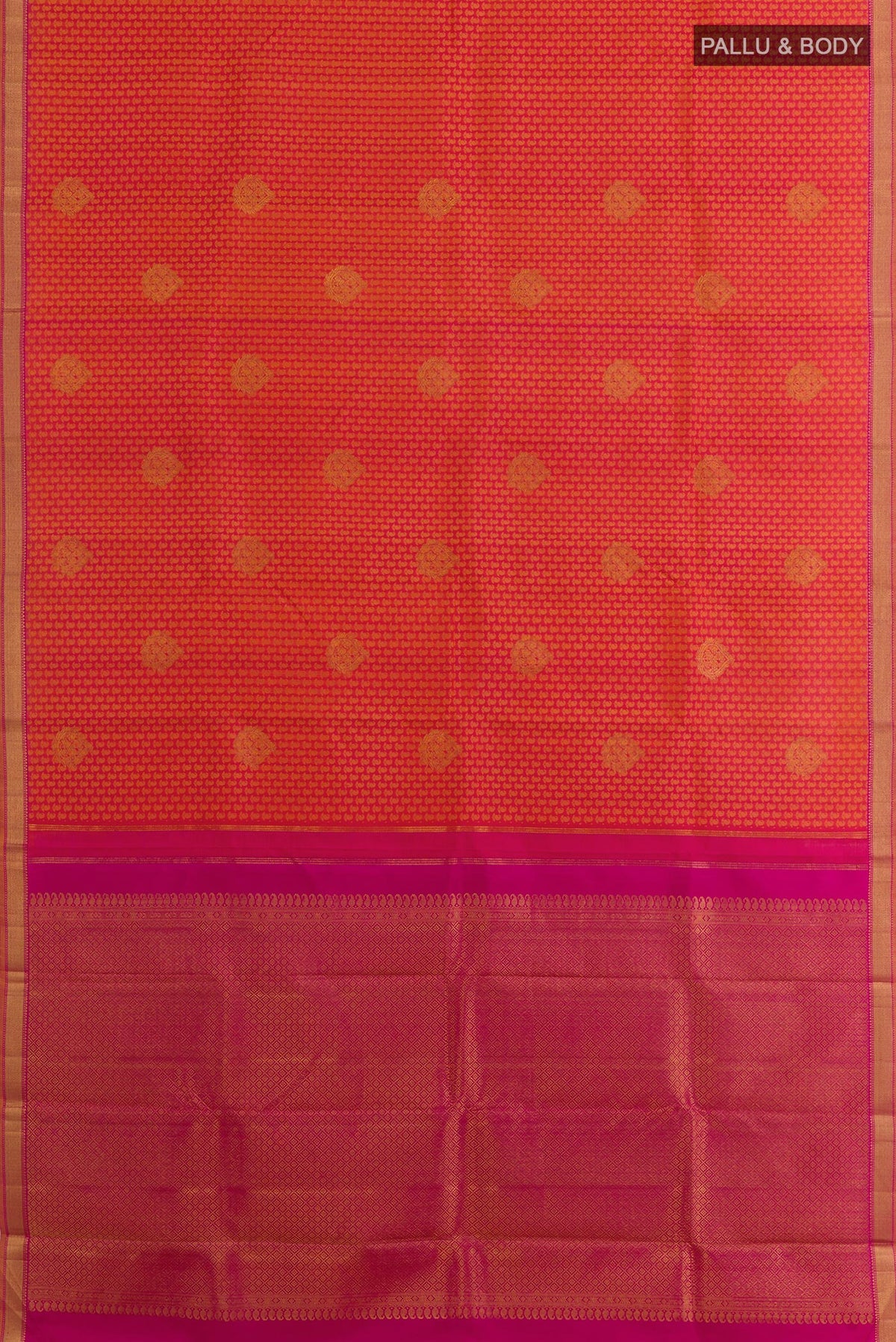 Flat view of Brick Orange Kanjivaram Silk Saree with Jacquard With Zari Butta on the body and Zari Border. 