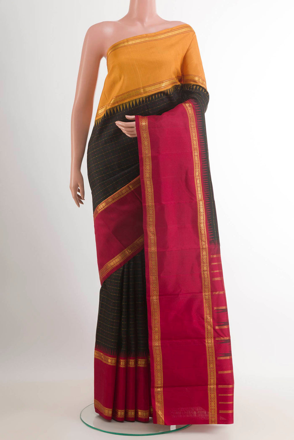 Black Kanjivaram Silk Saree with Checked design on the body and Ganga Jamuna Border.  displayed on a mannequin
