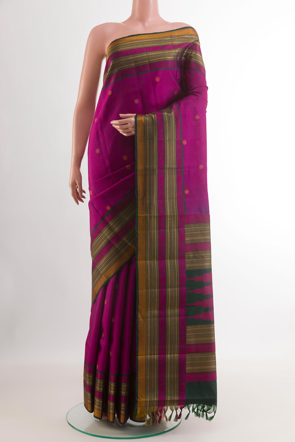 Purple Kanchipuram Silk Saree with Thread Butta on the body and Zari Border.  displayed on a mannequin