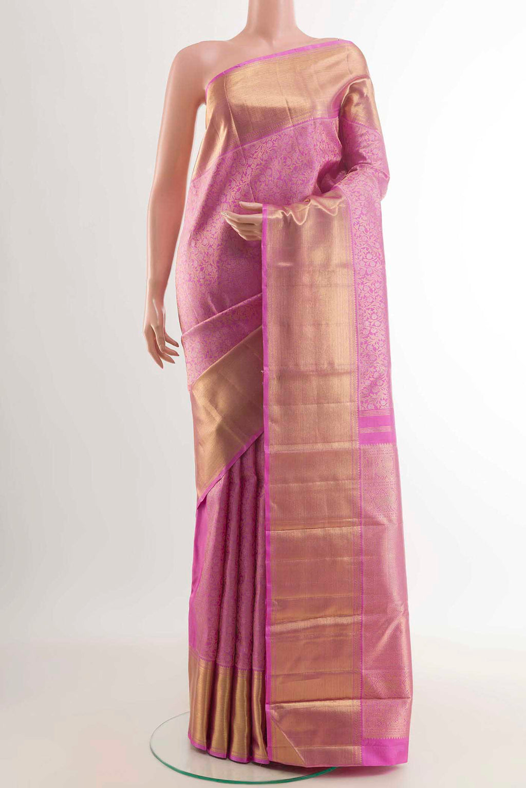 Pure Silk Pure Zari Pink Kanchipuram Saree with Zari Brocade on the body and Zari Border displayed on a mannequin