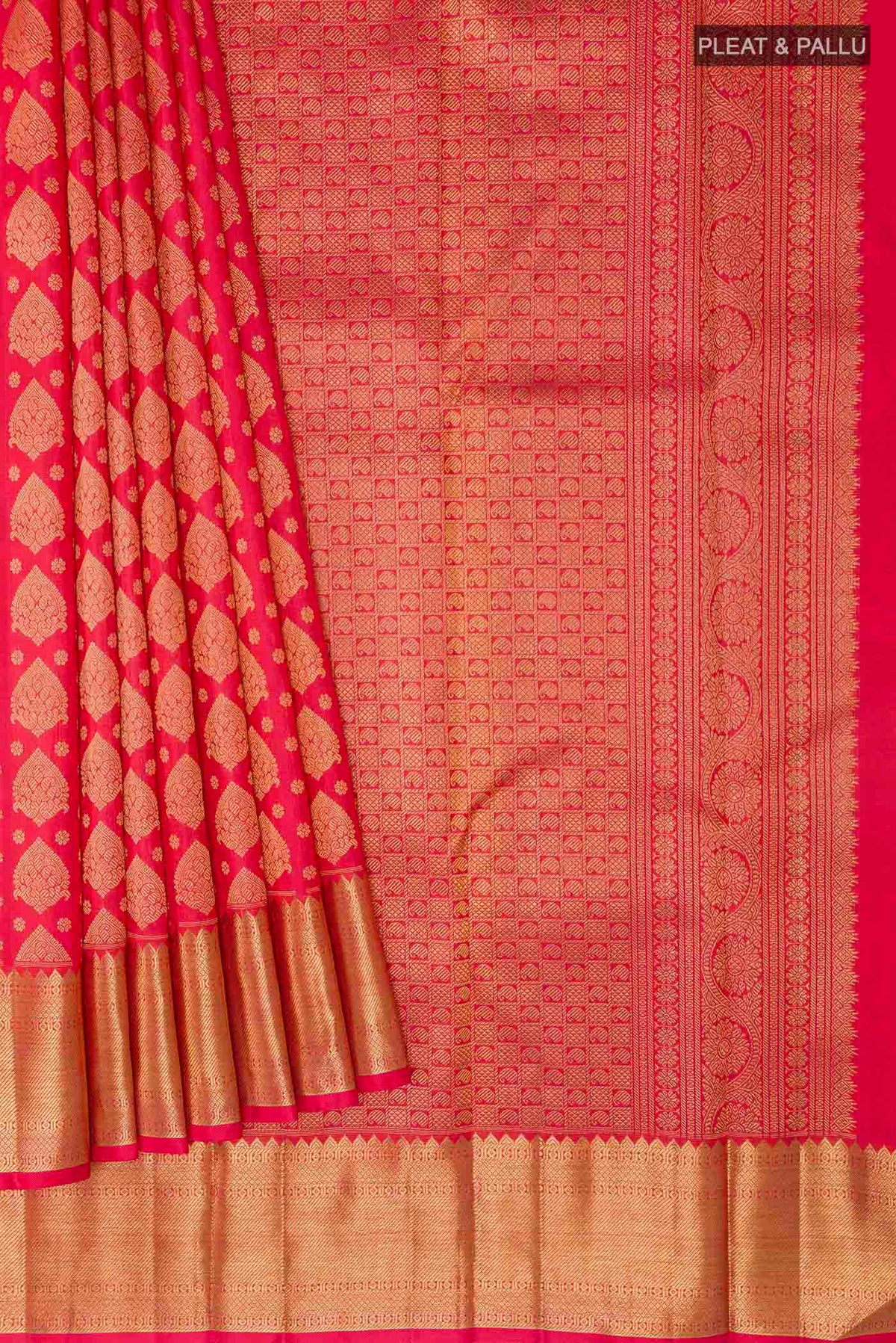 Pleats and pallu of Pure Silk Pure Zari Red Kanchipuram Saree with Zari Butta on the body and Zari Border