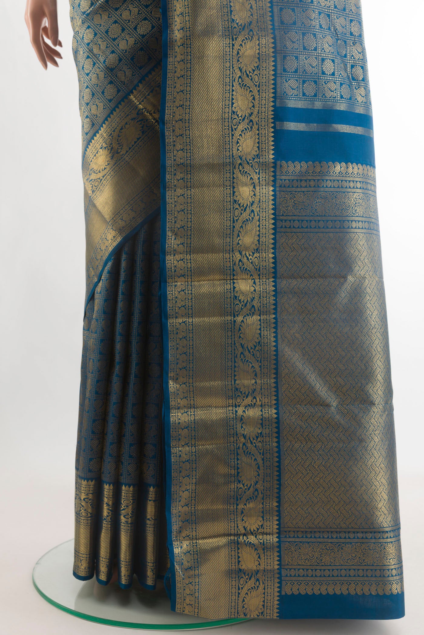 Pleats and pallu of Pure Silk Pure Zari Blue Kanjivaram Saree with Zari Brocade on the body and Zari Border. 