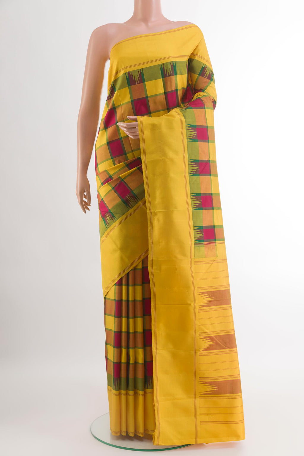 Multi Color Kanjivaram Silk Saree with Checked design on the body and Plain Border.  displayed on a mannequin