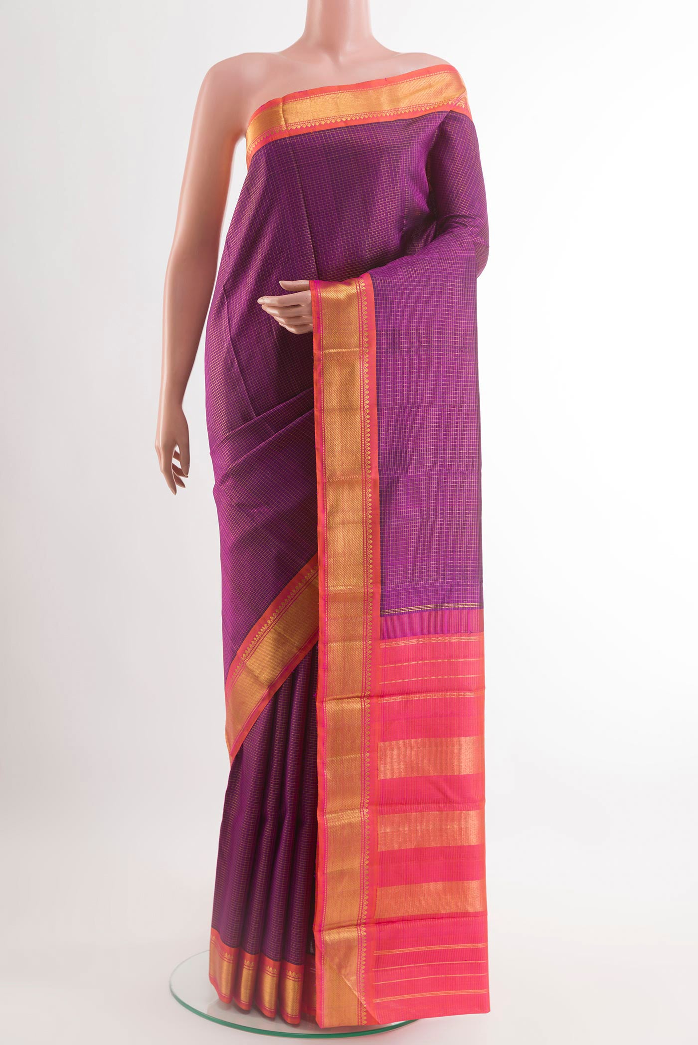 Purple Kanchipuram Silk Saree with Checked design on the body and Zari Border.  displayed on a mannequin