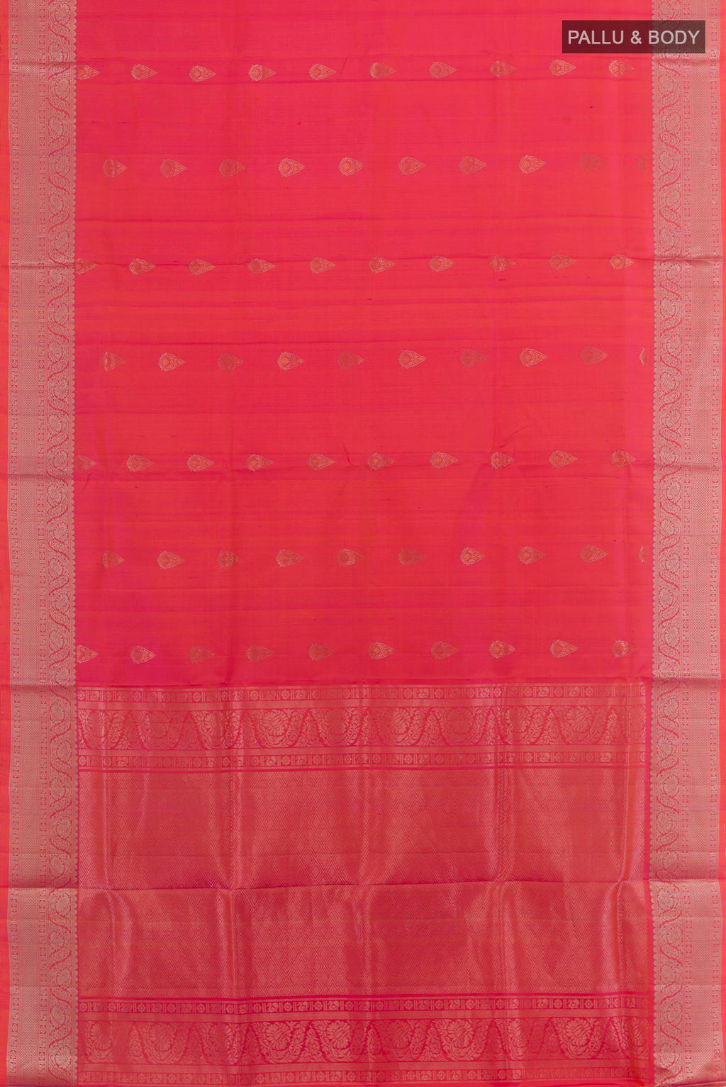 Flat view of Pink Soft Silk Saree with Zari Butta on the body and Zari Border. 