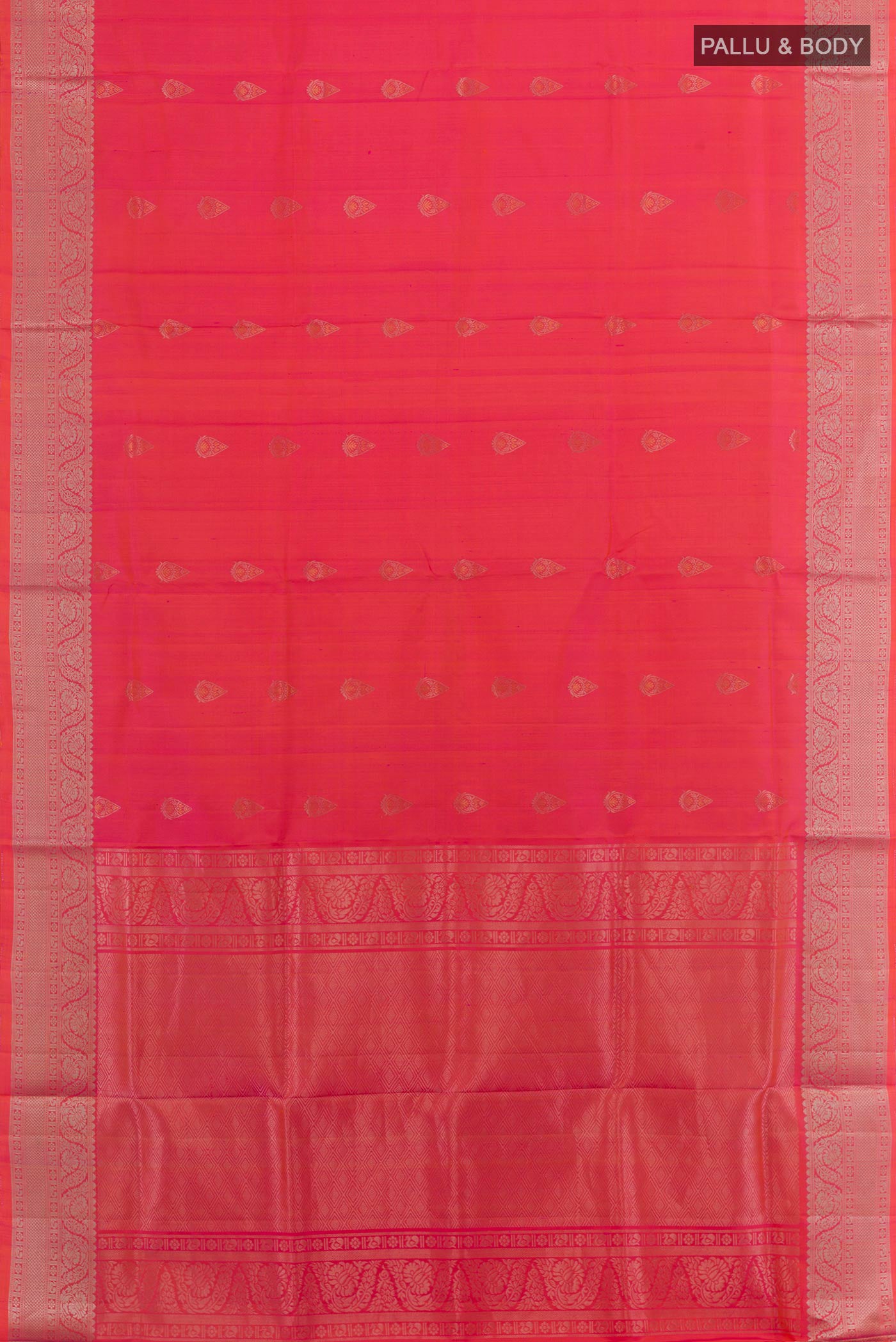 Flat view of Pink Soft Silk Saree with Zari Butta on the body and Zari Border. 