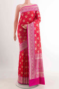 Red Banarasi Silk Saree with Zari Butta on the body and Zari Border displayed on a mannequin