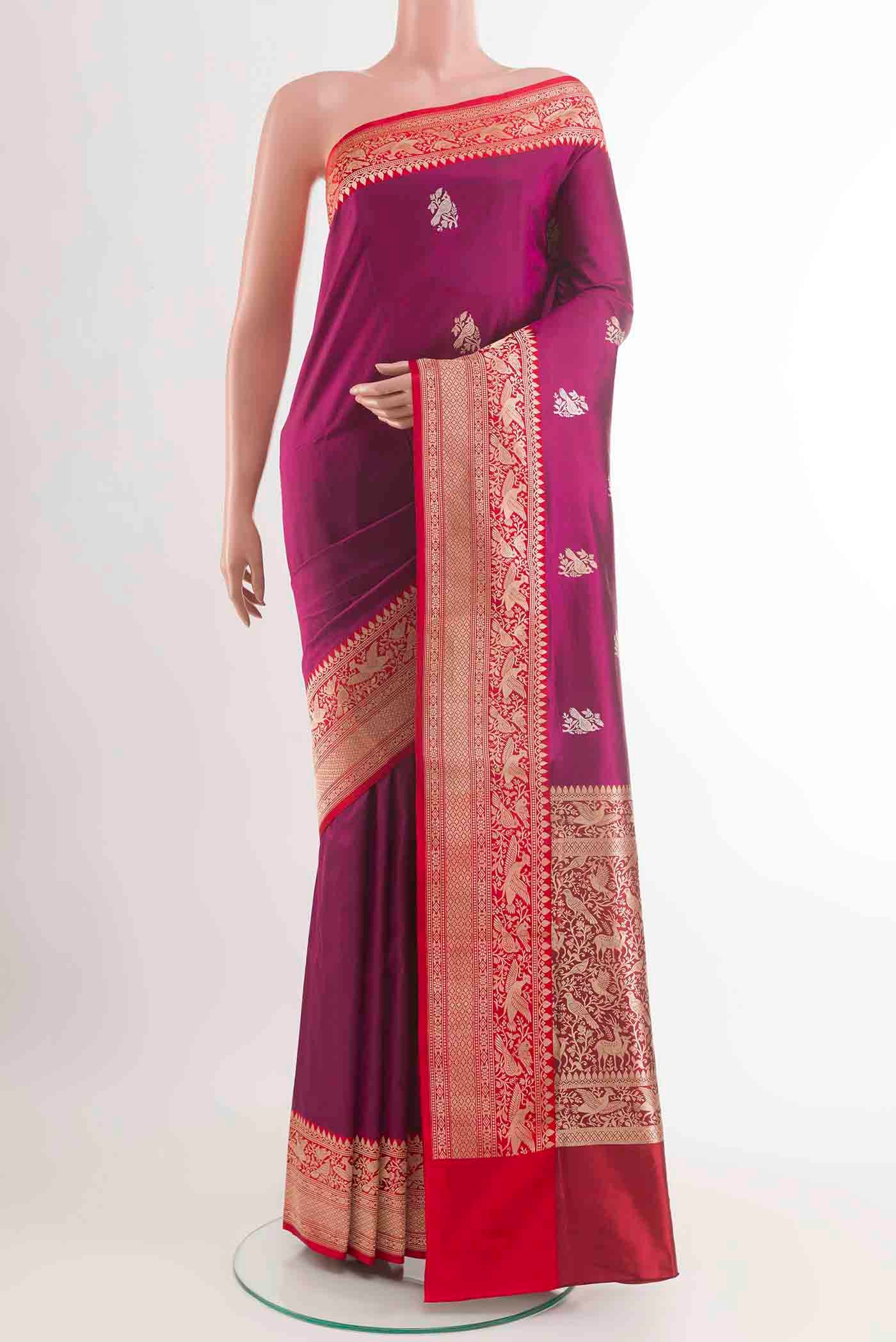 Purple Banarasi Katan Silk Saree with Zari Butta on the body and Zari Border displayed on a mannequin