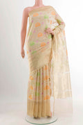 Beige Banarasi Kora Silk Saree with Thread Brocade on the body and Zari Border displayed on a mannequin