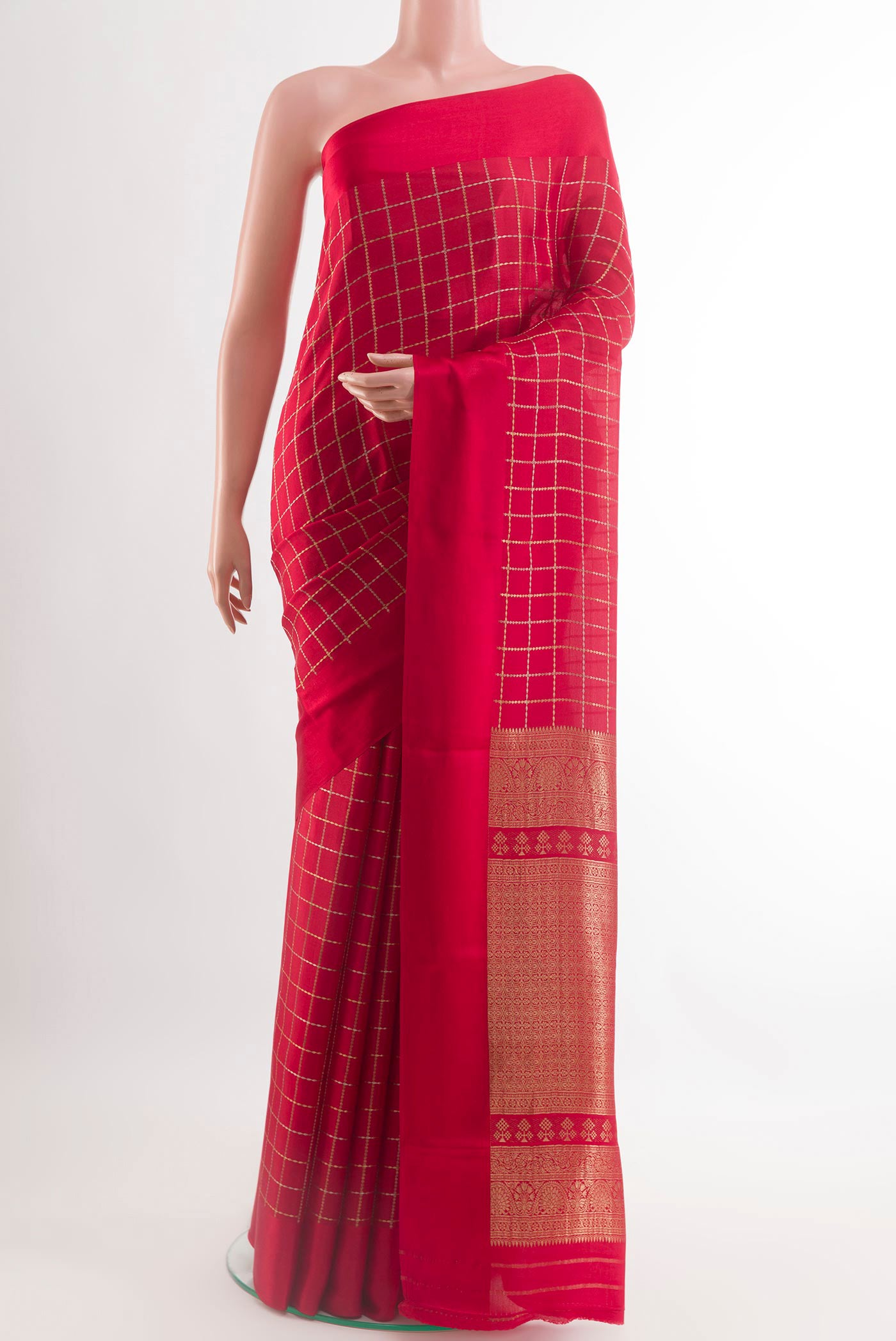 Red Mysore Crepe Saree with Checked design on the body and Plain Border.  displayed on a mannequin