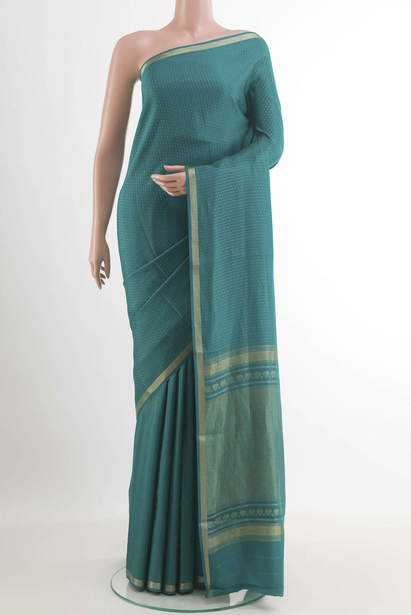 Sea Green Mysore Crepe Saree with Stripes on the body and Zari Border.  displayed on a mannequin