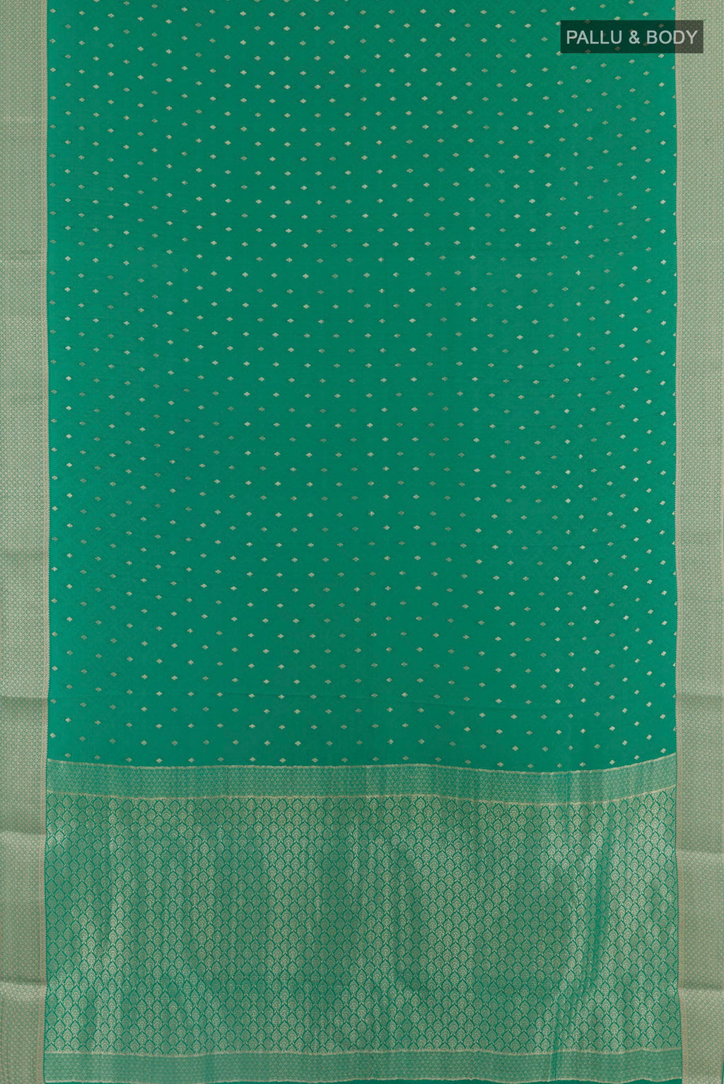 Flat view of Green Mysore Crepe Saree with Zari Butta on the body and Plain Border. 