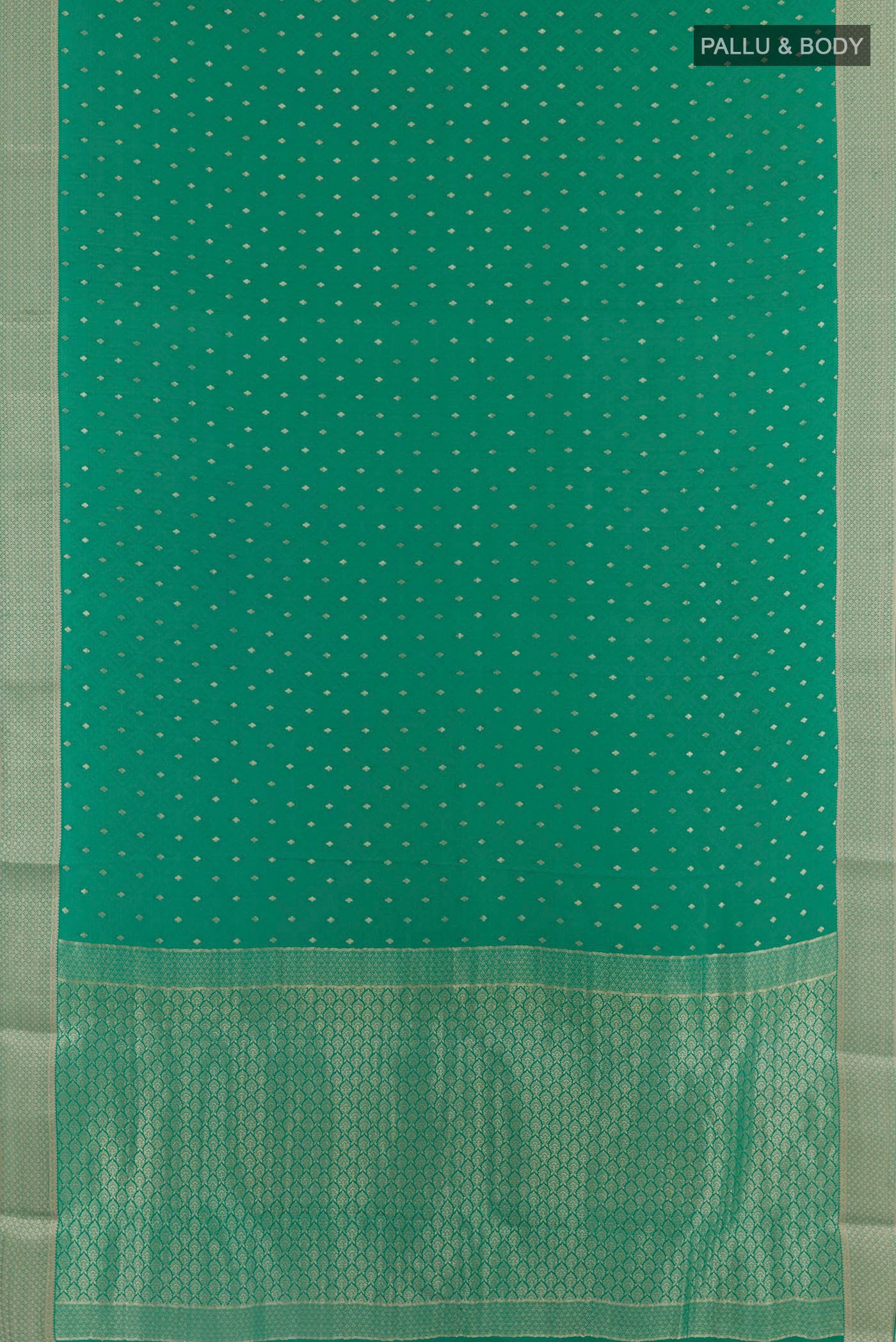 Flat view of Green Mysore Crepe Saree with Zari Butta on the body and Plain Border. 