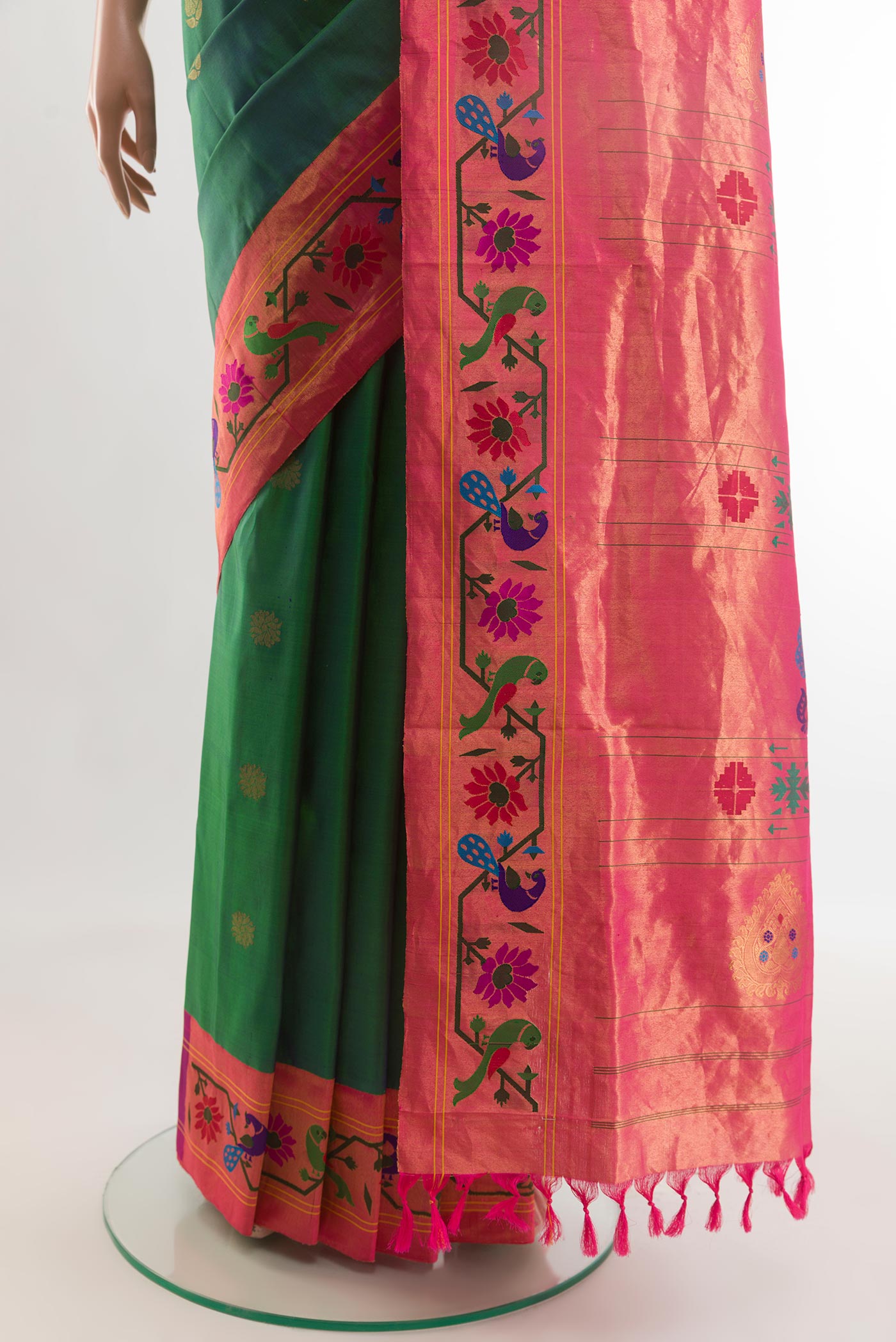 Pleats and pallu of Green Gadwal Silk Saree with Zari Butta on the body and Paithani Border. 