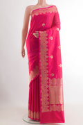 Pink Banarasi Katan Silk Saree with Zari Butta on the body and Zari Border.  displayed on a mannequin