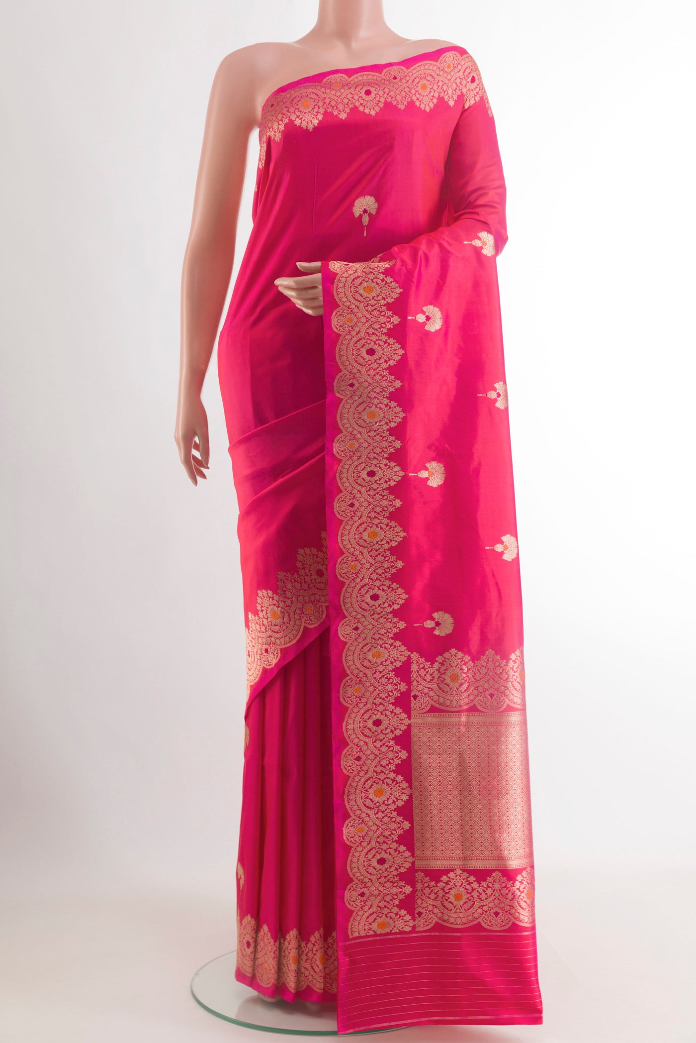Pink Banarasi Katan Silk Saree with Zari Butta on the body and Zari Border.  displayed on a mannequin