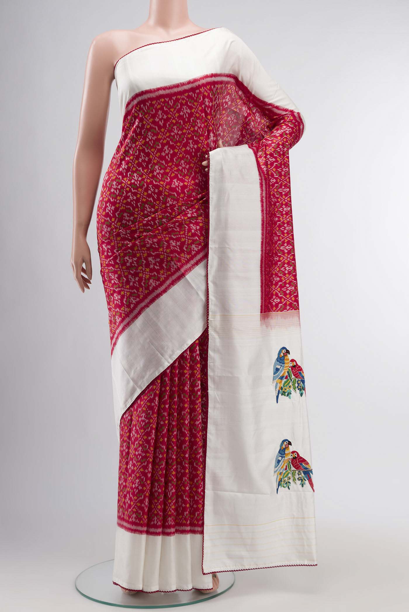 Red Rajkot Patola Silk Saree with Pure Ikat on the body and Embroidery Border displayed on a mannequin