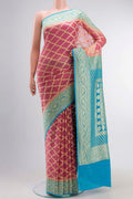 Pink Banarasi Georgette Saree with Zari Butta on the body and Zari Border displayed on a mannequin