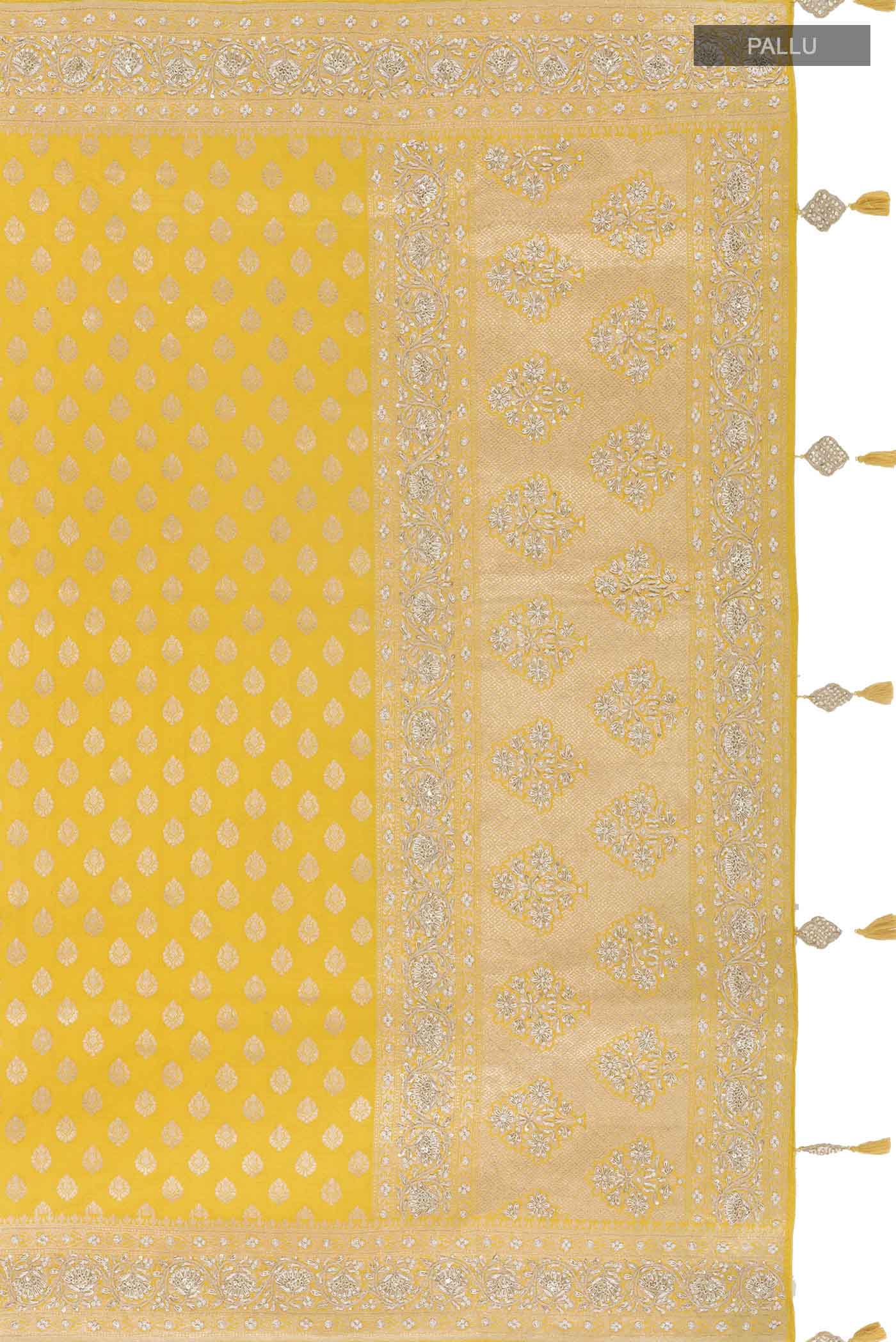 Close up image of the pallu of Yellow Banarasi Silk Saree with Zari Butta on the body and Sequin Border
